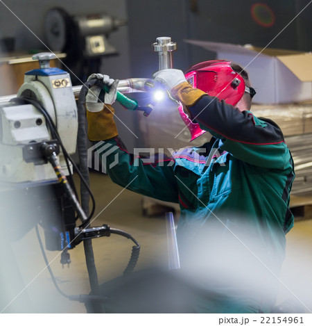 Industrial worker welding in metal factory. Industrial worker welding in metal factory. 22154961