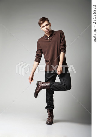 Young male fashion model posing in casual outfit Young male fashion model posing in casual outfit 22156823