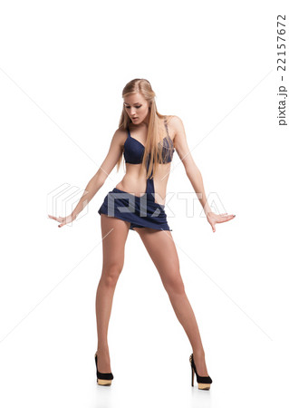 Young beautiful dancer posing on studio background 22157672