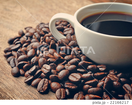 Coffee on grunge wooden background Coffee on grunge wooden background 22166217