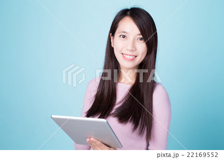 happy woman using tablet pc happy woman using tablet pc 22169552