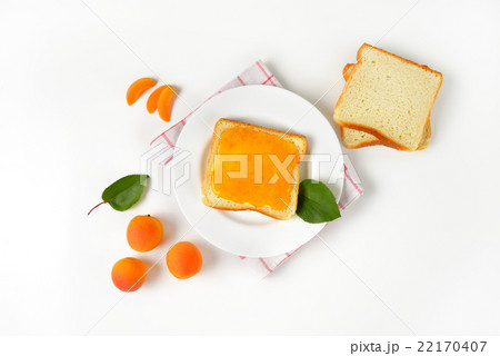 White bread with apricot jam White bread with apricot jam 22170407