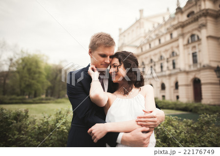 Beautiful wedding couple, bride, groom kissing and 22176749