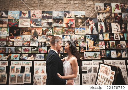 Gorgeous wedding couple, bride, groom kissing and 22176750