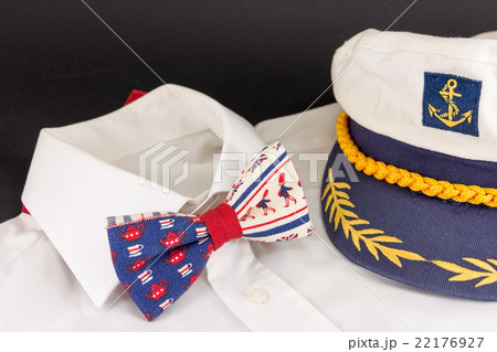bow tie, shirt and a captain's hat bow tie, shirt and a captain's hat 22176927