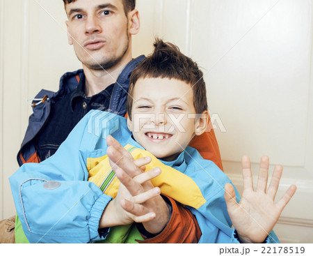 young handsome father with his son fooling around young handsome father with his son fooling around 22178519
