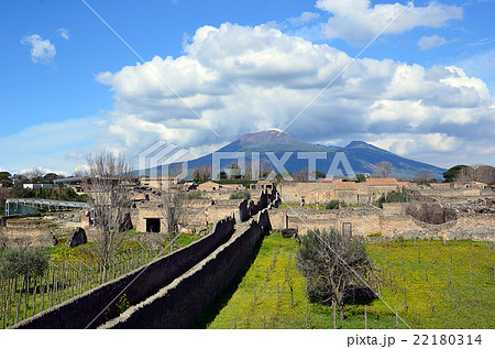 long road and vesuvius cloudy sky from pompei city long road and vesuvius cloudy sky from pompei city 22180314
