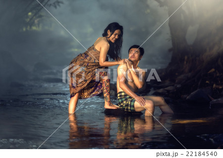 Asian couple bathing at cascade 22184540