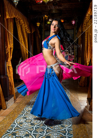 Beautiful belly dancer young woman in gorgeous 22189719