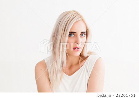 Confident cute young woman on white background Confident cute young woman on white background 22201751