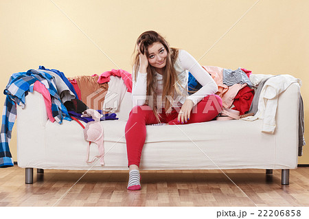 Desperate helpless woman in messy room home. Desperate helpless woman in messy room home. 22206858