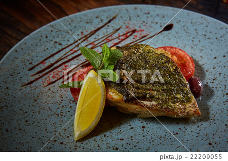 Fish dish - fried fish and vegetables 22209055