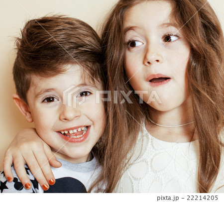 little cute boy and girl hugging playing on white 22214205