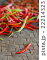 Two red hot chili peppers. 22214323