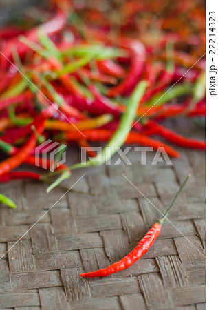 Two red hot chili peppers. 22214323