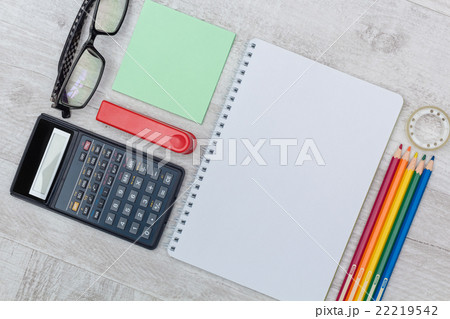 flat lay: notepad and calculator flat lay: notepad and calculator 22219542