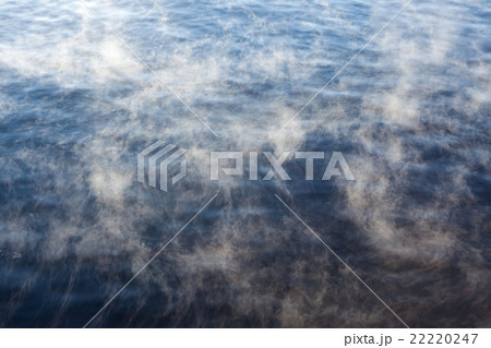 Water vapor on surface of cold water Water vapor on surface of cold water 22220247