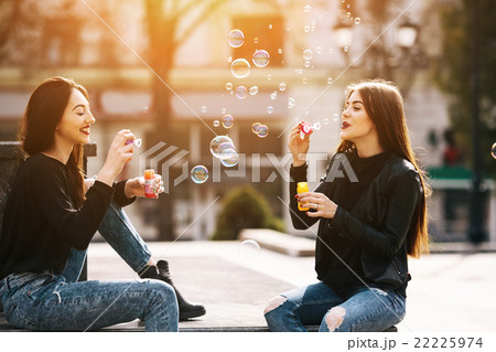 Two young adult girls Two young adult girls 22225974