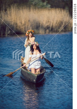 Two beautiful girls in boat 22226028