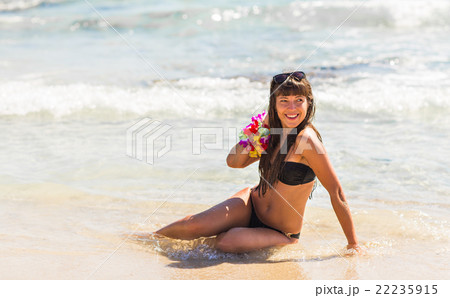Beautiful Lady in a Swimsuit on the Sea.  22235915