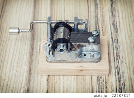 Old little music box on the wooden background, retro style 22237814
