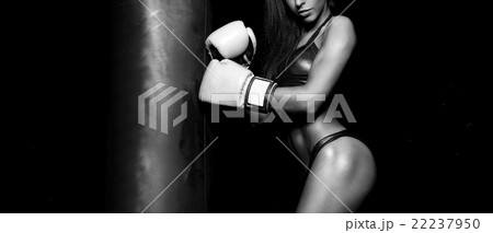 sexy and fit female fighter posing in combat poses 22237950