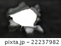 White hole in the black paper. Black-and-white 22237982