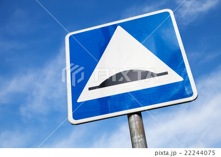 Speed Bump. Square road sign over cloudy sky Speed Bump. Square road sign over cloudy sky 22244075