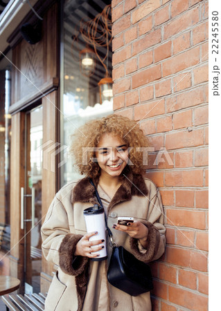 young pretty african american women drinking 22245580