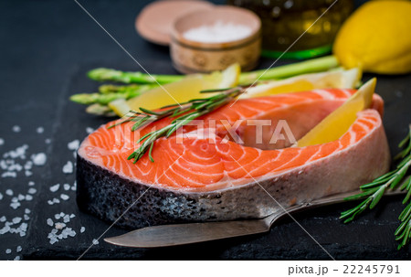 Delicious portion of fresh salmon steak Delicious portion of fresh salmon steak 22245791