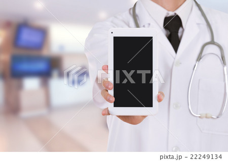 doctor showing tablet computer blank screen  22249134