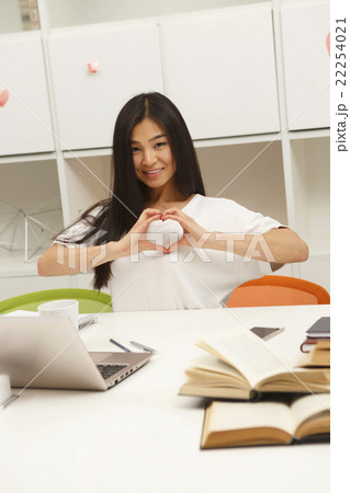 Asian student communicating Asian student communicating 22254021