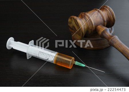 Gavel And Medical Injection Syringe On Black Gavel And Medical Injection Syringe On Black 22254473