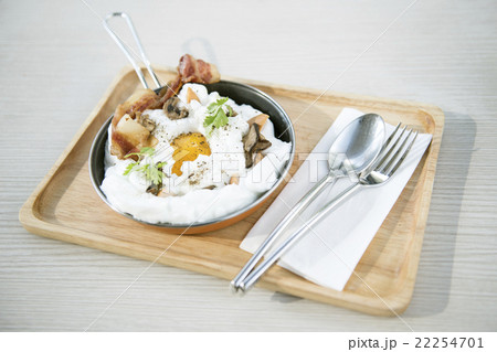 Breakfast set eggs, ham, sausage with morning light. 22254701