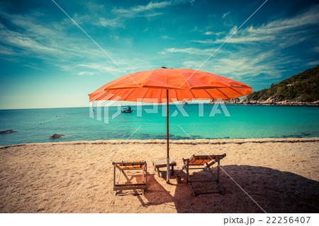 Beach chair with umbrella in seashore 22256407