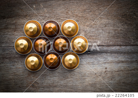Nespresso capsule on wooden background. 22264105
