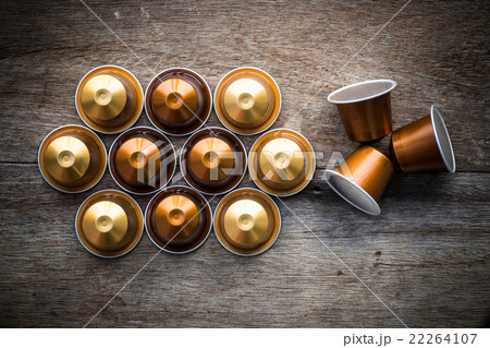 Nespresso capsule on wooden background. 22264107