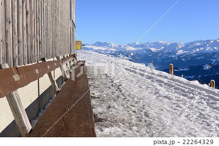 View from Rigi Kulm in winter with wooden bench 22264329