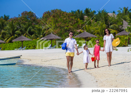 Happy beautiful family on a tropical beach holiday Happy beautiful family on a tropical beach holiday 22267091