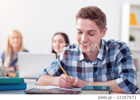 Male student studying in the class Male student studying in the class 22267871