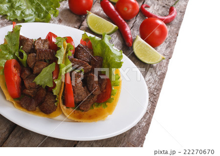 Mexican fast food: tacos stuffed with meat Mexican fast food: tacos stuffed with meat 22270670