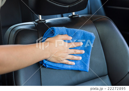 Hand with microfiber cloth cleaning Interior car 22272895