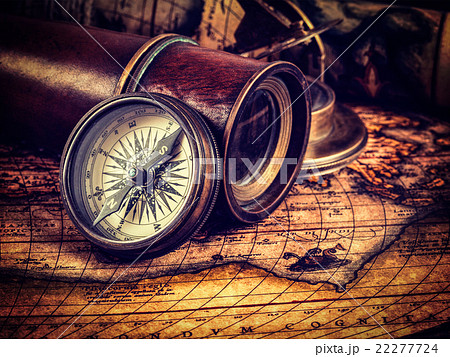 Old vintage compass on ancient map 22277724