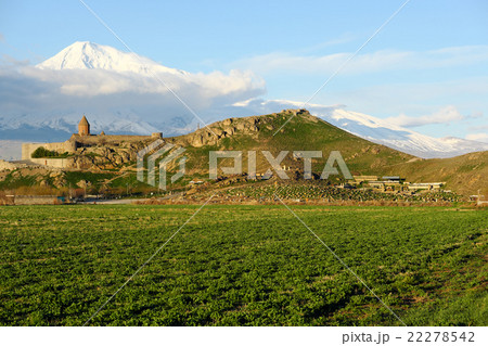 Ancient monastery in front of mountain 22278542