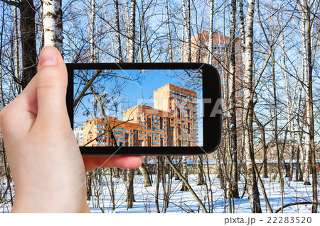 hand holds smart phone isolated 22283520