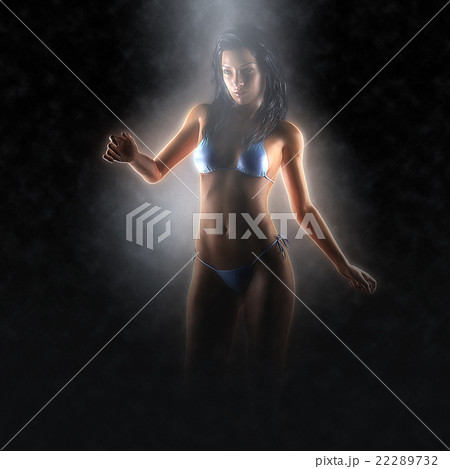 Sexy brunette bikini woman posing in dark studio 22289732