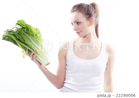 Girl holding a green salad Girl holding a green salad 22290006