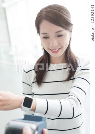 woman pay by smart watch woman pay by smart watch 22292141