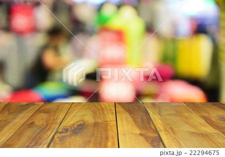 blurred wood table and people in the shopping mal 22294675