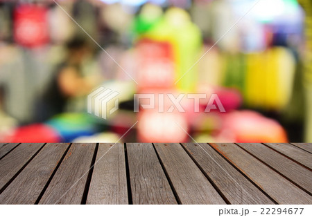 blurred wood table and people in the shopping mal 22294677